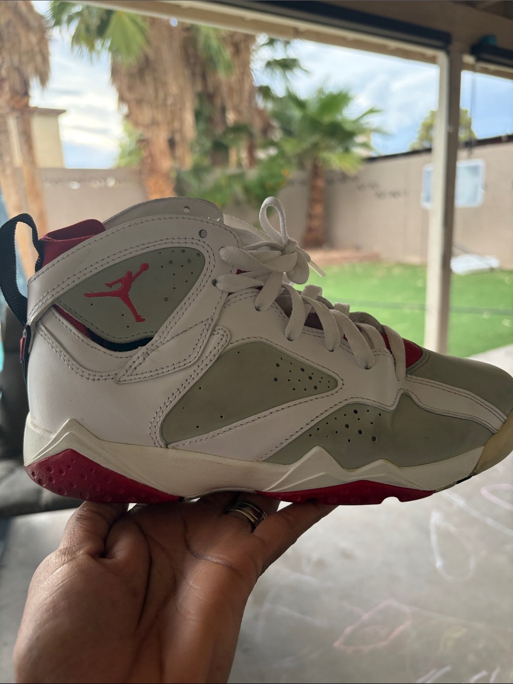 Air Jordan 7 Retro "Hare" sneakers  white, gray, and red, size 5.5Y